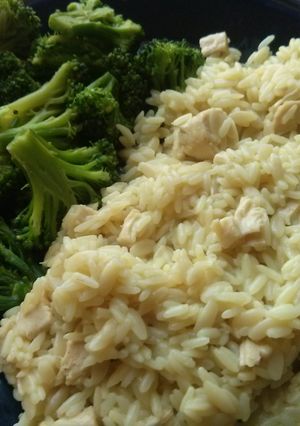 A picture of Chicken and Rice with Broccoli.