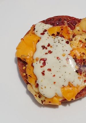 A picture of Spam Pizza Top Blue Cheese Sauce.