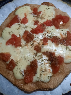 Una foto de Pizza de harina integral