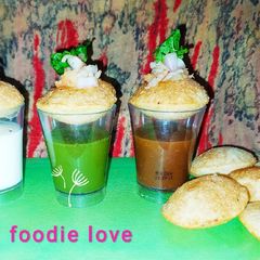 A picture of Golgappa shots cocktail.