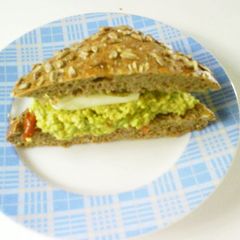 A picture of Tomato and Cheese Sandwich with Pesto alla Genovese.