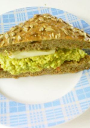 A picture of Tomato and Cheese Sandwich with Pesto alla Genovese.