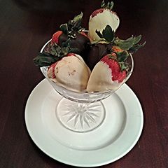A picture of White and Dark Chocolate Covered Strawberries.