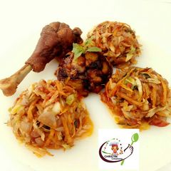 A picture of Fried chicken with masala vegetable sauce and diced dodo.