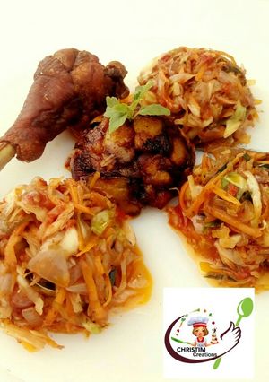 A picture of Fried chicken with masala vegetable sauce and diced dodo.