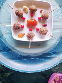 A picture of Dates Ladoo or Lollipop Recipe.