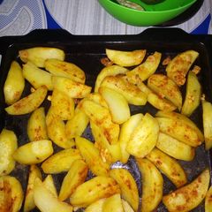 Oven Baked Potato wedges #charityrecipe A picture of Oven Baked Potato wedges #charityrecipe.