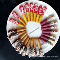 A picture of Chocolate covered Cookie sticks.