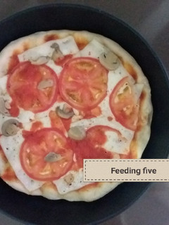 Una foto de Pizza vegetariana en sartén