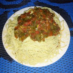 A picture of Spaghetti with vegetable stew.