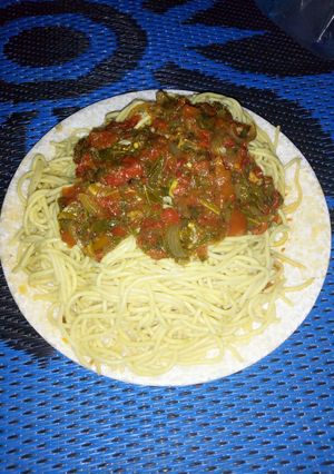 A picture of Spaghetti with vegetable stew.