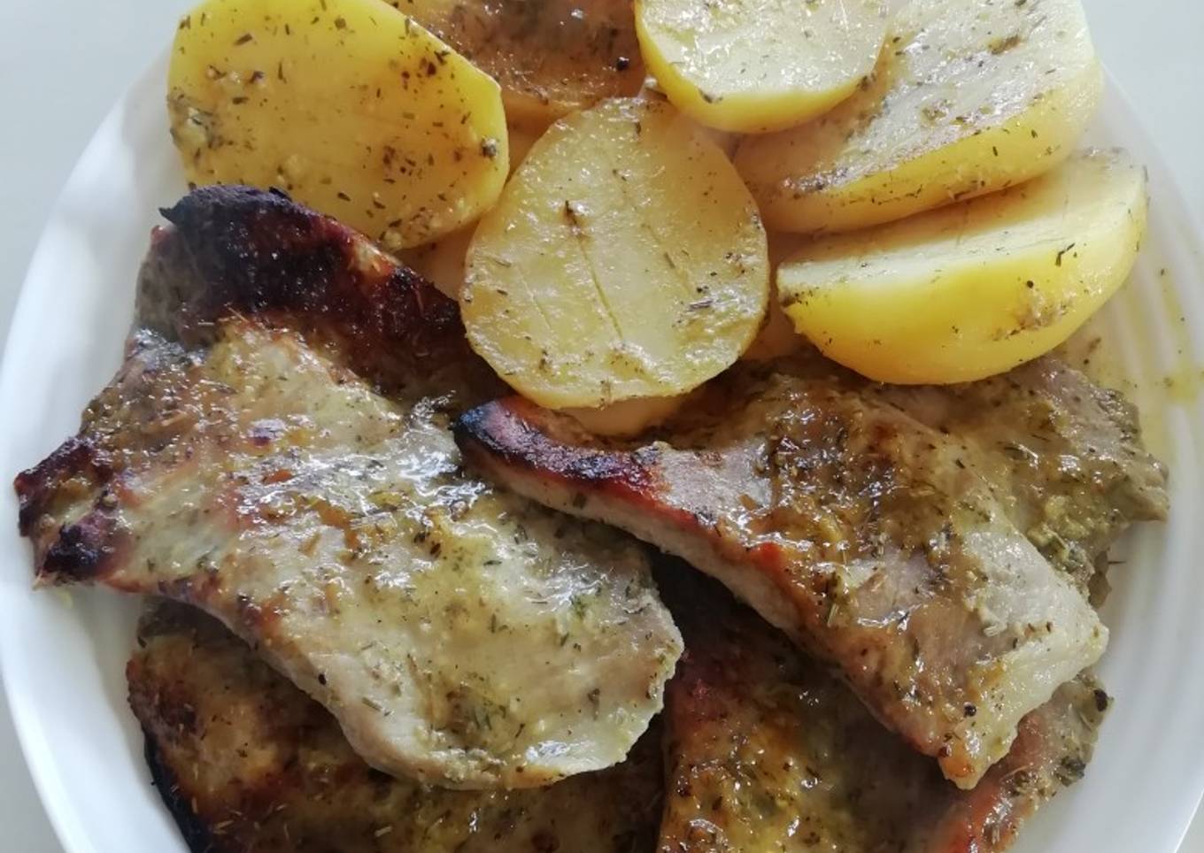 Secreto de cerdo con miel y mostaza