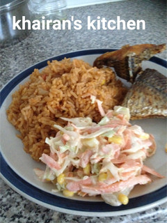 A picture of Jollof rice and coleslaw.