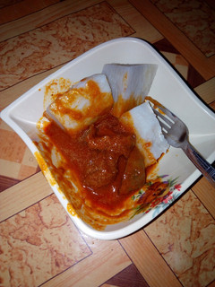 A picture of White yam and stew with meat.