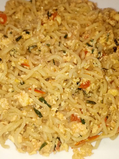 A picture of Instant indomie noodles with eggs.