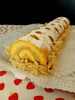 Una foto de Brazo gitano relleno de crema de castañas