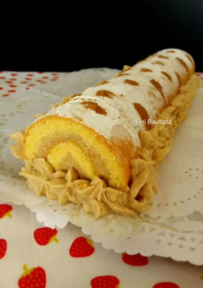 Una foto de Brazo gitano relleno de crema de castañas