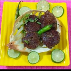 A picture of Kebabs in flour net bowl.