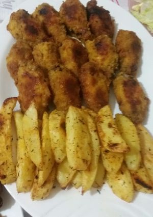 صورة لوصفة أجنحة الدجاج المقرمشة مع بطاطا في الفرن 😍