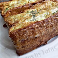 A picture of Egg coated Bread.