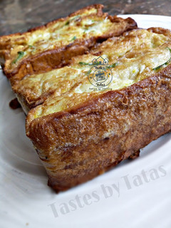A picture of Egg coated Bread.