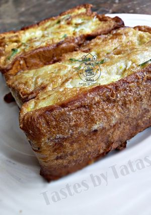 A picture of Egg coated Bread.