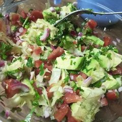 A picture of Lettuce and ovacado salad.