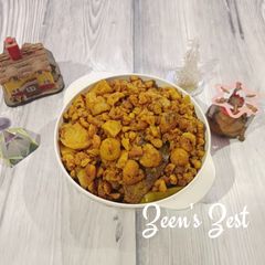 A picture of Urad Badi and Aloo Curry.