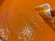 A picture of sweet potato tomato pepper soup