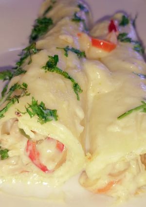 Una foto de Canelones de pollo con salsa crema al gratén