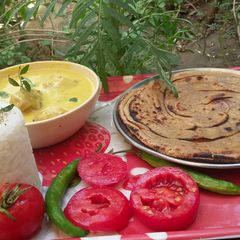 Lunch recipe Plain rice,pakoda kadhi and lachha paratha A picture of Lunch recipe Plain rice,pakoda kadhi and lachha paratha.