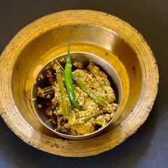 Data’r Koura (Drumstick in Coconut-Mustard paste) A picture of Data’r Koura (Drumstick in Coconut-Mustard paste).