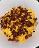 Papas con Queso Cheddar y Panceta
