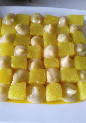 Une photo de Damier à l ananas poché au épices et sa crème mousseline