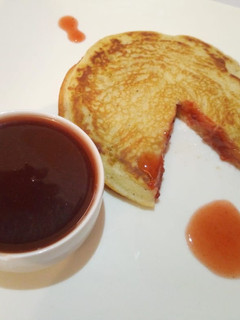 A picture of American Pancake with Jam sauce.