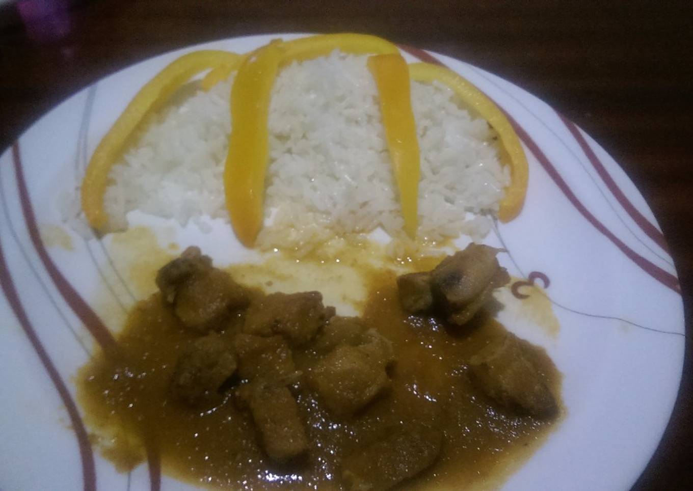 Stewed pork served with white rice