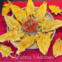 A picture of Spinach Leaves Fritters: (پالک کے پتوں کے پکوڑے).