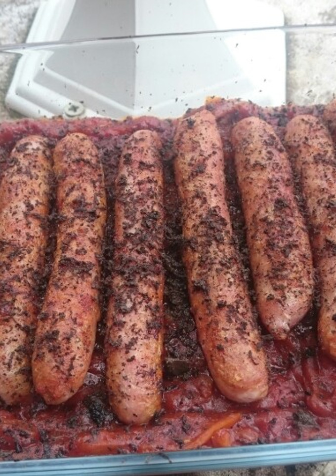 Una foto de Salchichas de pollo Recius con pimientos asados. Bychusmi
