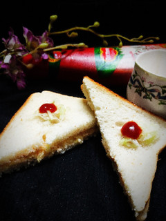A picture of Cucumber Curd Sandwiches.