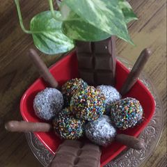A picture of Cake balls with nuts.