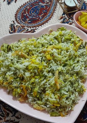 عکسی از دستور شویدپلو باقالی با مرغ ریش شده