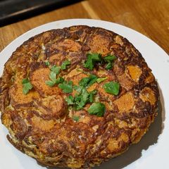 A picture of Sweet potato, red onion and cheese Spanish omelette Tortilla.