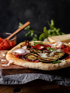 Una foto de Pizza berenjena y pepperoni