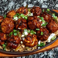 Shezwan chicken momos with hakka noodles😋 A picture of Shezwan chicken momos with hakka noodles😋.