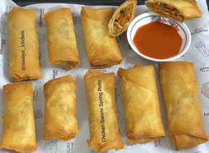 A picture of Chicken Salami Spring Rolls.