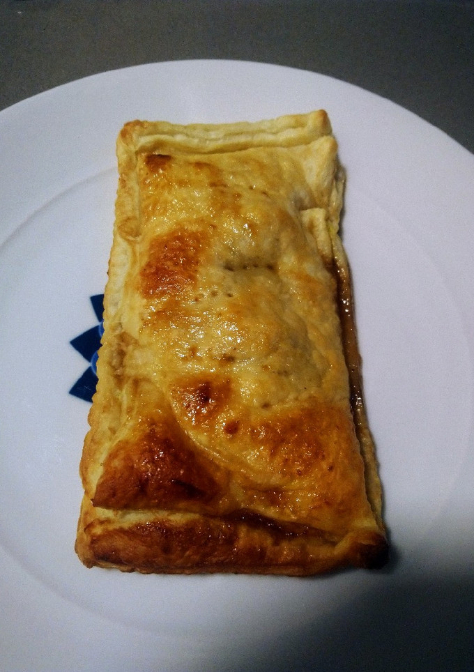 Una foto de Hojaldre de manzana caramelizada con mandarina