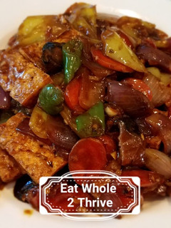 A picture of Fried tofu, onions and chillies in bean sauce #Vegan#.