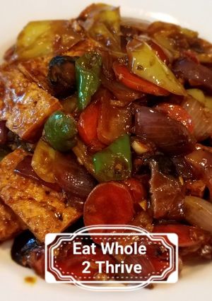 A picture of Fried tofu, onions and chillies in bean sauce #Vegan#.