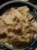 Mashed potatoes and hamburger meat with gravy