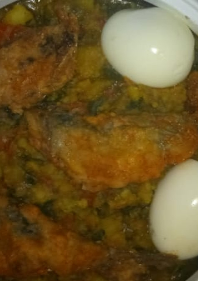 A picture of Beans and fish with boiled egg.
